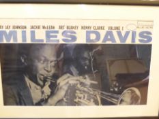 Five assorted photographic posters of Miles Davis, the American jazz trumpeter, various sizes, all