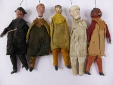 Five Antique Puppets, the puppets made from paper mache and linen with lead hands and are