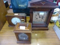 Three miscellaneous clocks comprising a money clock and two mantle clocks. (3)