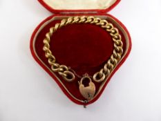 Lady`s 9ct Gold Hallmark Bracelet, with heart shaped clasp in the original velvet lined box approx