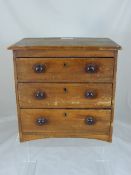 Edwardian Mahogany Apprentice Piece, the chest of drawers fitted with three long drawers.