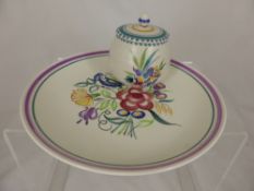 A Poole Pottery Plate, approx 26 cms in diameter together with a jam pot, impressed marks to base nr