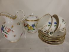 A Part `Richard Ginori` Porcelain Tea Set, comprising five tea cups, nine saucers lidded sugar