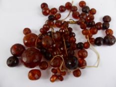 A Victorian Long Length Graduated Amber Beaded Necklace, the faceted beads ranging from .8mm to 3