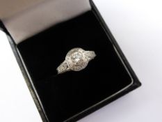 A Lady`s 18 ct White Gold Fancy Diamond Ring, the solitaire diamond set with diamonds to collar