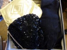 A collection of vintage gloves and handbags.