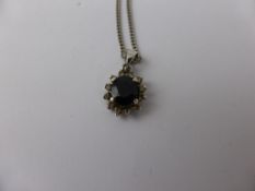 White Gold Sapphire and Diamond Pendant, on a 14k hallmark chain.