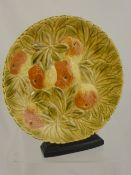A Rare Sarreguemines Maiolica Pottery Plate, decorated with oranges number 3283, crazing evident.