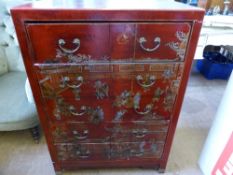 Contemporary Chinoiserie chest of drawers having five long drawers, red lacquer ground decorated