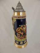 Large Porcelain and Pewter Stein, hand painted with scenes of men enjoying a pint, impressed marks