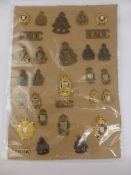 Card Display of Military Badges Royal Army Ordnance Corps, including officers and o/rs amongst