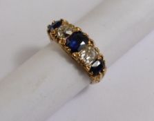 A lady`s 18 ct yellow gold, sapphire and diamond ring, size L, approx. 6 gms. 2 old diamonds 50 - 55