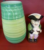 A Shelley vase, green banded design approximately 24 cms high together with a Toby jug.