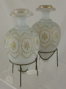 A Pair of Victorian Vaseline Vases, the vases having decorative gilt beading and scroll design, on