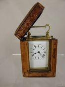 A Brass Carriage Clock, in original leather case - Lawson & Son Birmingham.