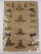 A Display Card of Military Badges to the Royal Regiment of Artillery, including cap and collar