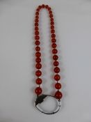 Antique Gold and Coral Necklace together with a Cornelian Part Silver Cameo Necklace.