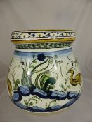 An Antique Italian Maiolica Vase, hand painted with heron, hare and wolf with garland decoration