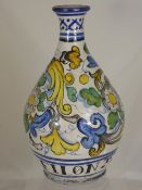 An Antique Italian Maiolica Ceramic Vase, hand painted with pomegranate and floral leaf scroll,