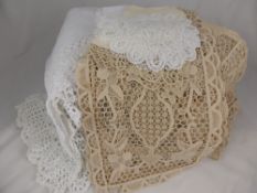 A Quantity of Antique Lace, including hand embroidery and Irish table linen.