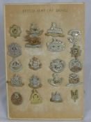 A Miscellaneous Collection of Military Cap Badges including Royal Scots Greys East Surrey,