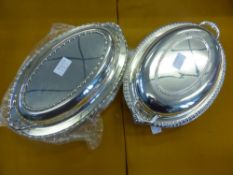 A Large Quantity of Silver Plate, including Tea Trio, Napkin Rings, Three Entree dishes etc