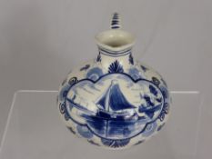 A Blue and White Delft Jug signed Erven Lucas Bols, Amsterdam, Holland approx 17 cms high.