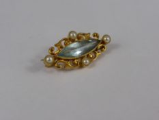 A Lady`s Antique 18 ct Gold Aquamarine and Seed Pearl Brooch,  pearls 4 x 2.5 mm, aqua 16 x 5 mm,