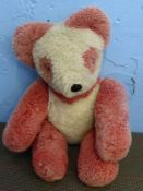 Vintage Red and White Teddy Bear, articulated limbs with glass eyes.