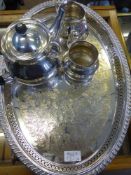 A Silver Plated Tea Trio comprising teapot, sugar bowl, milk jug and an oval tray.