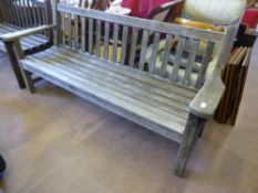 A Rustic Teak Garden Bench, 190 x 61 x 90 cms, the bench from a `good` Winchcombe home. .