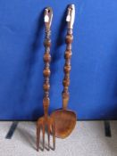A Decorative Hand Carved Tribal Wall Spoon and Fork, Philippine makers label.