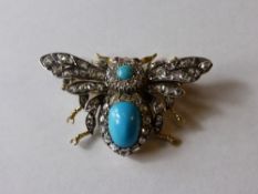 A Lady`s 18 ct Gold and Silver Insect Brooch, the brooch set with both round and oval cut cabachon