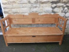 A Large oregon Pine Kitchen Bench, with storage under a lift top lid.