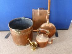 Five copper items including a coal bucket, a bed warming pan, a rattle, a pestle and mortar