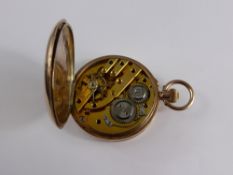 A Gent`s 9ct Gold Half Hunter Pocket Watch, with Roman numerals on enamel dial.