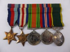 A group of five Second World War Medals awarded to 1471317 BDR. R Scarrott RA incl. Defence Medal,