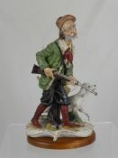 A Capo di Monte Figure of a Huntsman, with the original certificate.