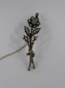 A Lady`s Silver Seed Pearl and Cat`s Eye Flower Spray Brooch.