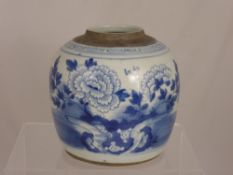 A Circa 19th Century Blue and White Chinese Ginger Jar, the jar depicting flowers, 18 cms high.