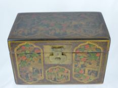 An Antique Qing Dynasty Chinese Elm Lacquered Box, the black lacquered box having coloured gilding