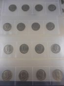 Sixteen US Liberty Dollar Coins and sixteen Half Dollar Coins together with a 1964 J F Kennedy