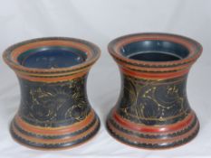 A Pair of Indonesian Style turned lacquered wooden lidded pots, the pots decorated with black