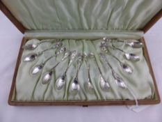A set of twelve solid silver teaspoons, marked Sterling, in the original case.