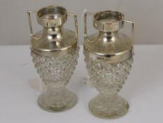 A pair of cut glass silver topped vases, Birmingham hallmarked, mm S & A (2)