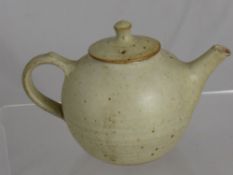 A Winchcombe Pottery Teapot circa 1985, the bespeckled oatmeal teapot with Ray Finch marks to body.