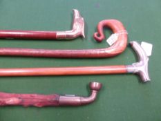 A Vintage Shepherds Crook, together with a glass handled walking stick with bird of prey handle and