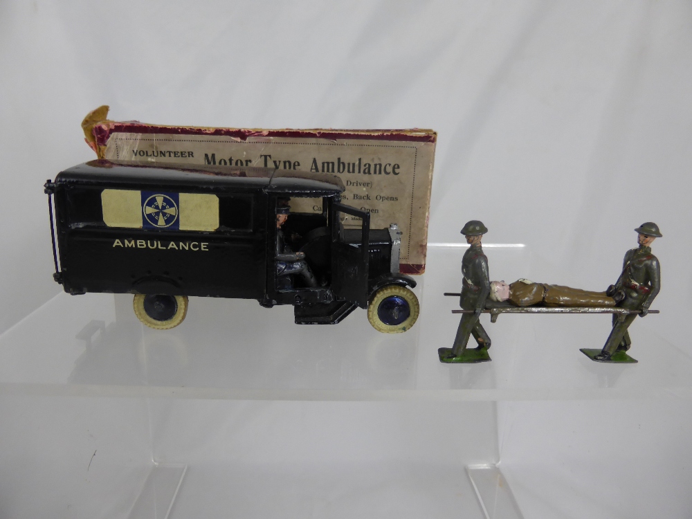 A Vintage Motor Type Ambulance - Volunteer Corps - by W Britain in original box together with lead