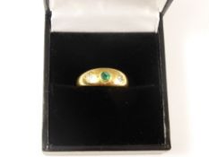 A Gentleman`s 9ct Gold Diamond and Green Stone Ring, Size M, approx 3.1 gms.