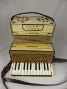 A Vintage Honer Accordion, together with a Champion Band Accordion.